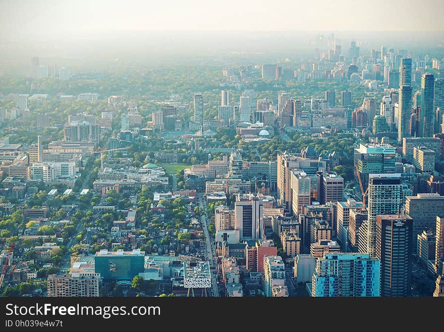 Aerial over city skyline with smog or fog in daytime. Aerial over city skyline with smog or fog in daytime.