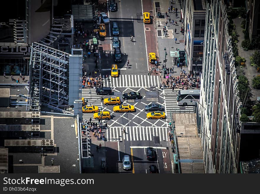 City streets and an intersection with traffic. City streets and an intersection with traffic.