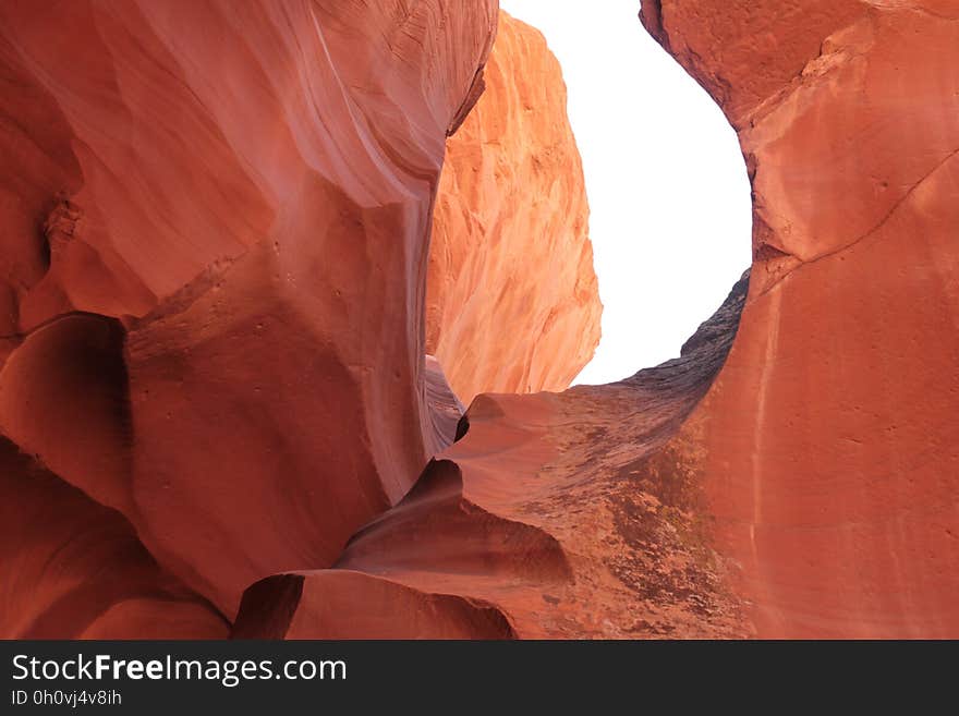 Abstract background created by canyon formed by erosion (stream or river) of red sandstone. Abstract background created by canyon formed by erosion (stream or river) of red sandstone.