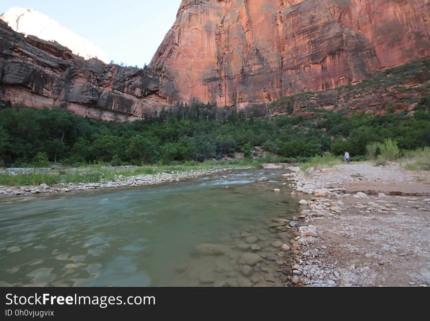 A river running in the bottom of a canyon. A river running in the bottom of a canyon.