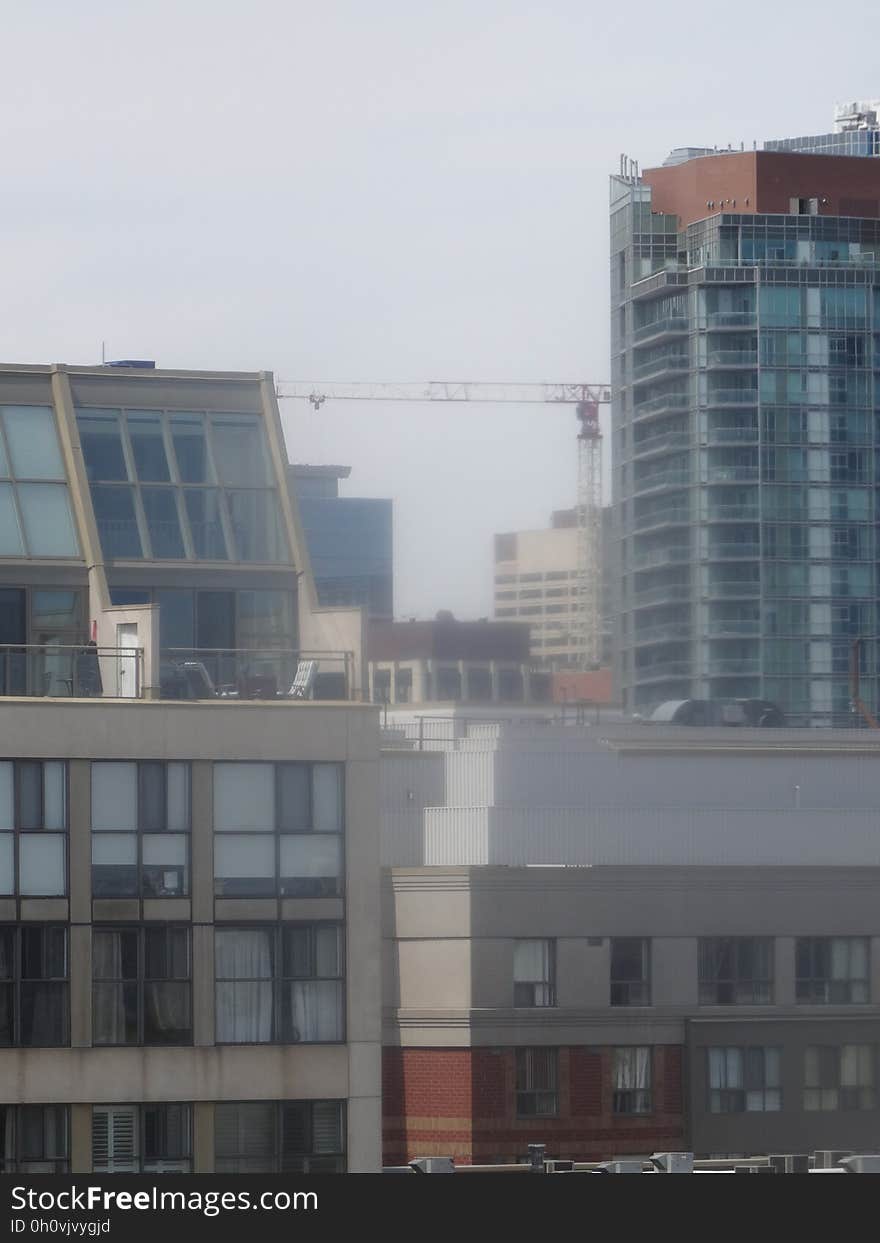 Distant construction cranes on Toronto&#x27;s skyline, 2016 05 11 -b