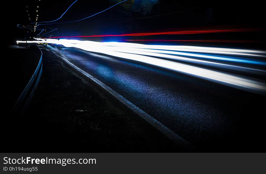 Streaks of white and red lights from cars at night. Streaks of white and red lights from cars at night.