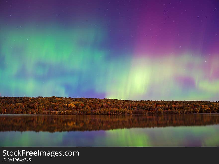 Colorful auroras on the sky at night. Colorful auroras on the sky at night.