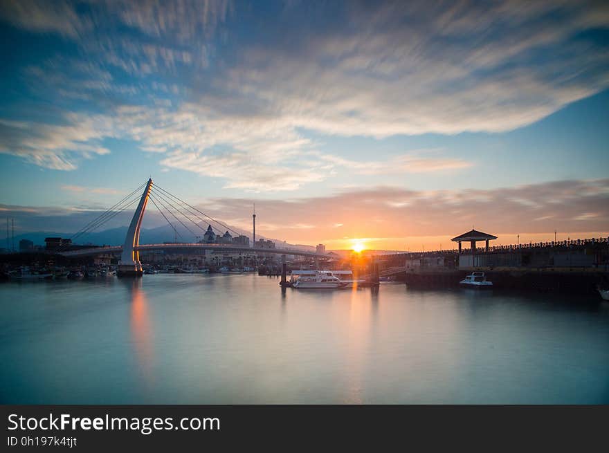 Lover Bridge of Fisherman's Wharf in Tamsui District, New Taipei City, Taiwan at sunset. Lover Bridge of Fisherman's Wharf in Tamsui District, New Taipei City, Taiwan at sunset.