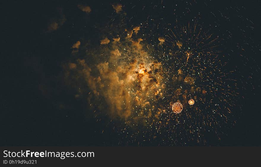 Fireworks exploding on the night sky. Fireworks exploding on the night sky.