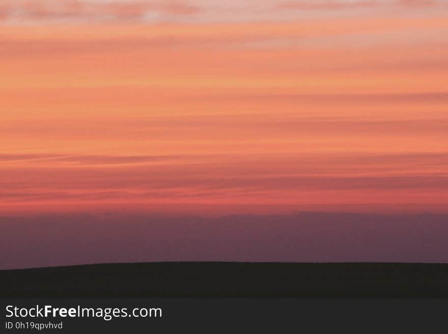 Silhouette of Land during Sunset