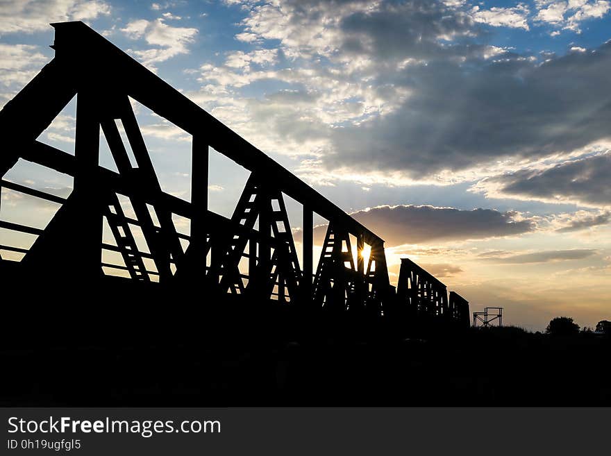 Silhouette of Bridge during Sunset