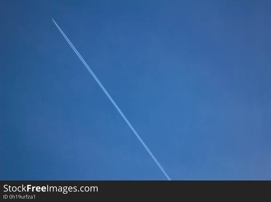 Aircraft Passed on Blue Sky during Daytime