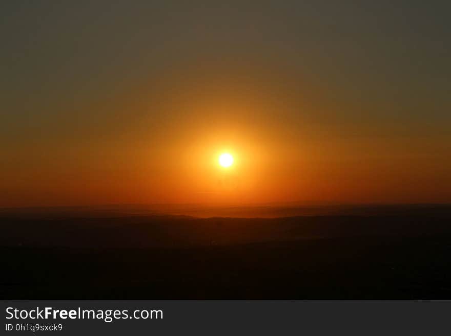 A sunset occurs when the sun descends below the horizon and the light of the day slowly fades. This photo was taken over the city. Location. Iasi, Romania. A sunset occurs when the sun descends below the horizon and the light of the day slowly fades. This photo was taken over the city. Location. Iasi, Romania.