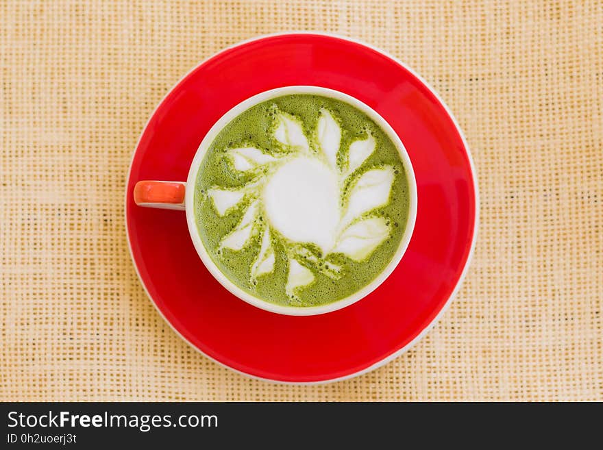 Matcha Drink on Red Ceramic Bowl