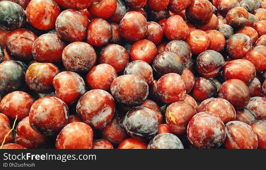 Piled of Red Plums