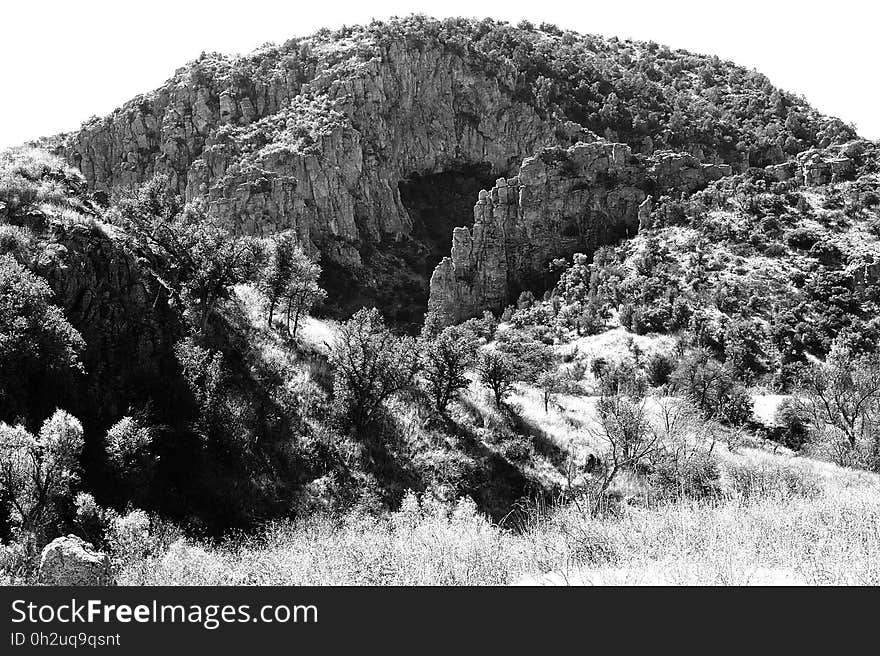 Gray Scale Photo of Mountain during Daytime