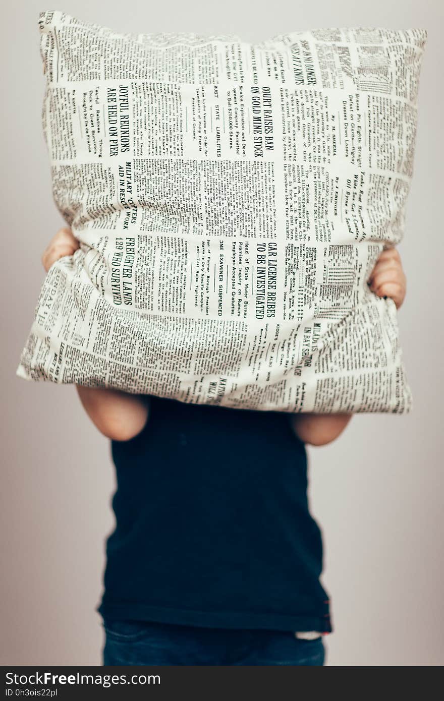 Person in Black Shirt Cover His Face With Newspaper Design Throw Pillow