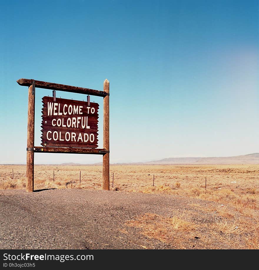 Welcome to Colorful Colorado Synage Under Blue Sky during Day Time