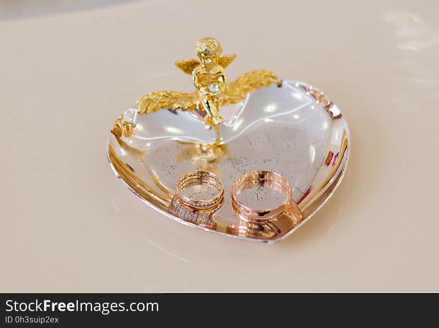 Wedding rings on a plate in the registry office