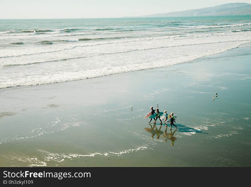 Surfers on Beach