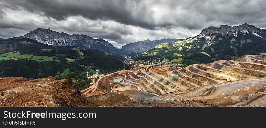 Brown Rice Terraces Under Gray White Sky during Daytime