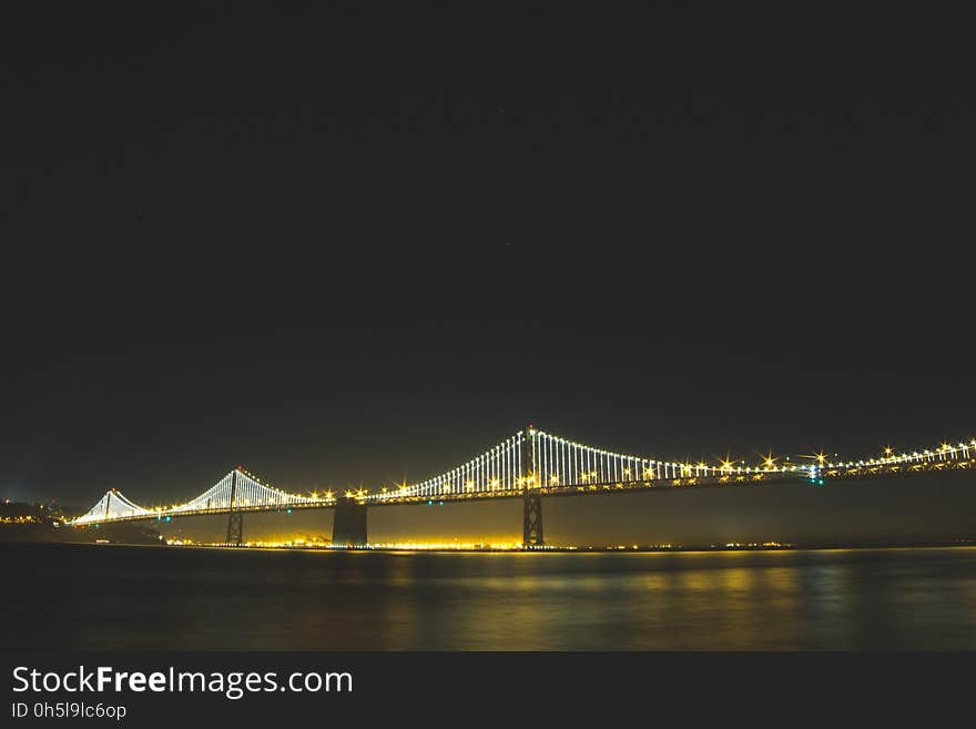 Lighted Bridge at Nighttime