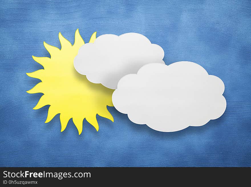 Abstract background - two clouds and sun on blue background