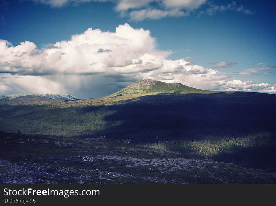 Clouds Near Mountain during Daytome