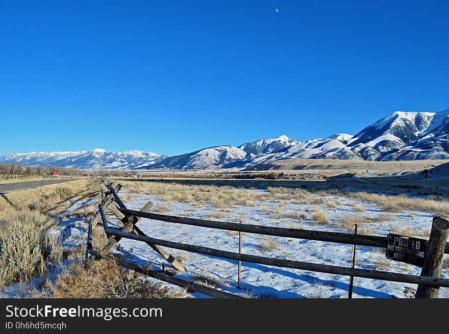 Brown Wooden Fence in Mountain Range