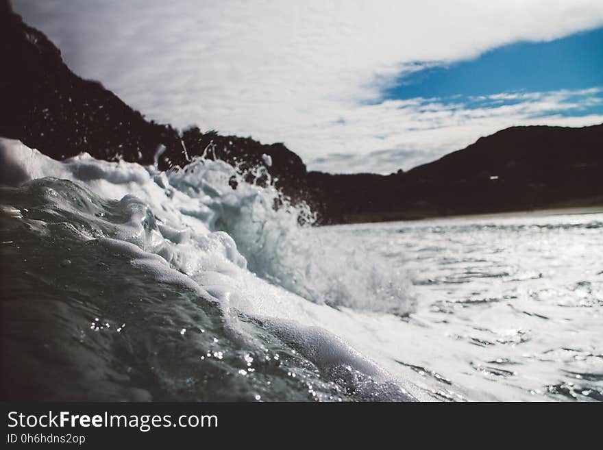 Ocean Wave Splash on the Stone