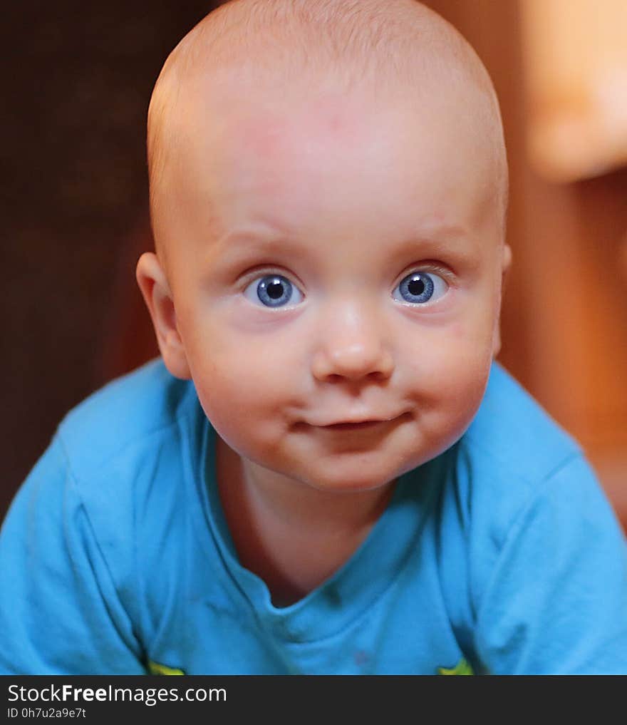 Baby Wearing Blue Crew Neck Shirt