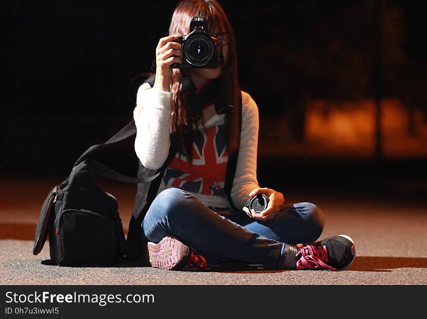 Woman in White Long Sleeve Shirt Taking Picture during Nightie