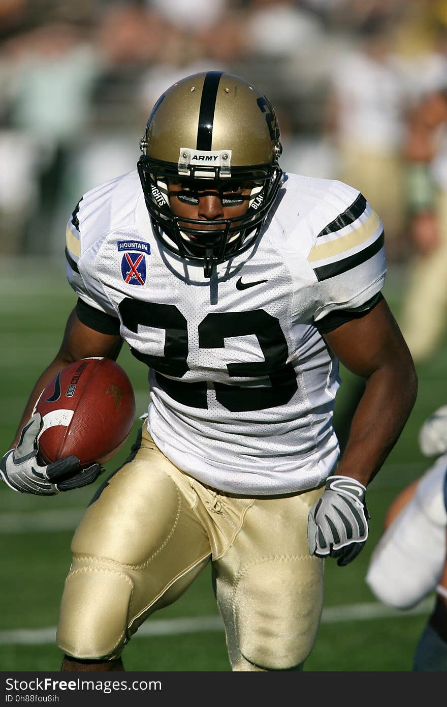 Man Wearing White Nike 23 Football Jersey on Green Field