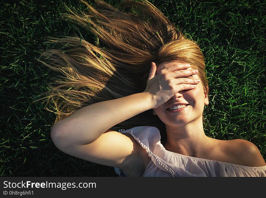 Beautiful woman having fun in the park. Beautiful woman having fun in the park.