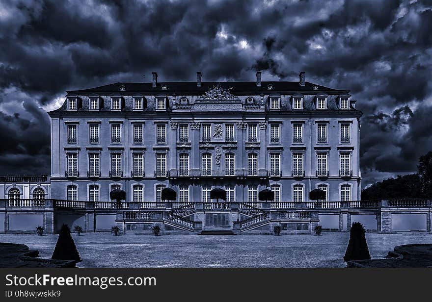 View of Building Against Cloudy Sky