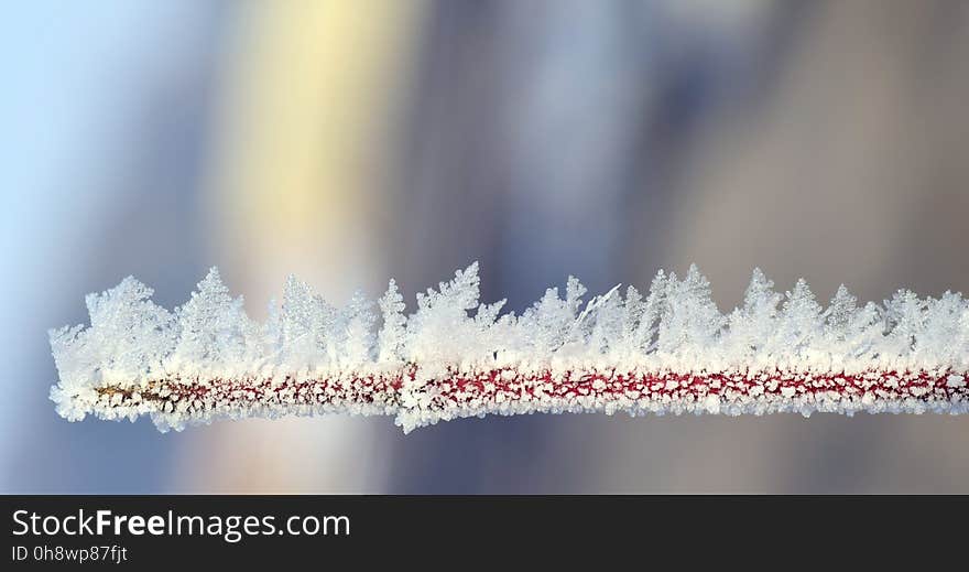 Close-up of Frozen Lake Against Sky during Winter