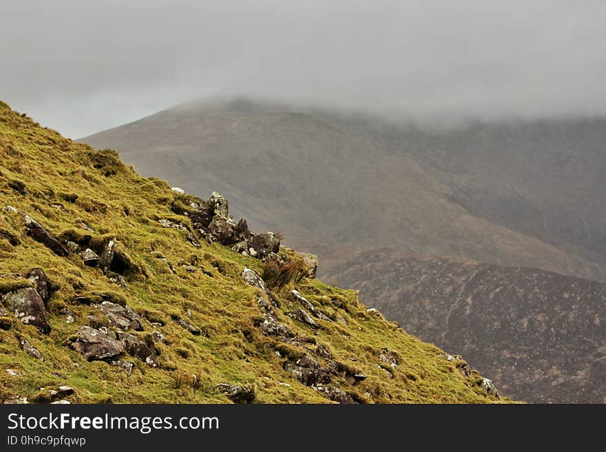 Above Conor&#x27;s Pass in Ireland where the clouds covered the tops of nearby hills. Above Conor&#x27;s Pass in Ireland where the clouds covered the tops of nearby hills.