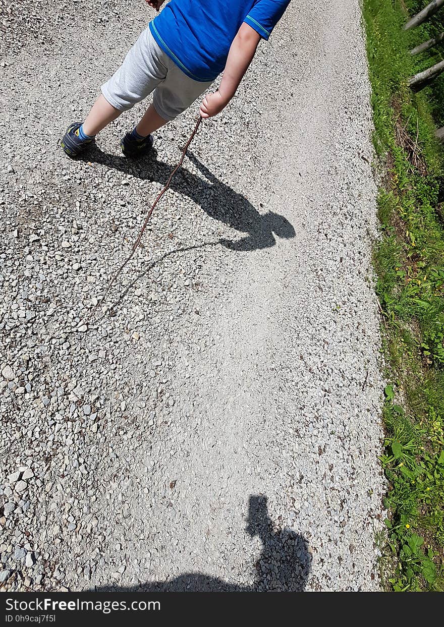 Road surface, Asphalt, Grass, People in nature, Walking shoe, Tar