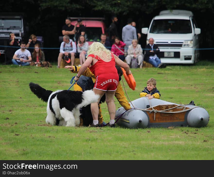 A Newfoundland Rescue dog helping Pamela Anderson rescue someone that had fallen out of their boat. The Cheshire Game & Angling Fair at Peover Hall, Knutsford. A Newfoundland Rescue dog helping Pamela Anderson rescue someone that had fallen out of their boat. The Cheshire Game & Angling Fair at Peover Hall, Knutsford.