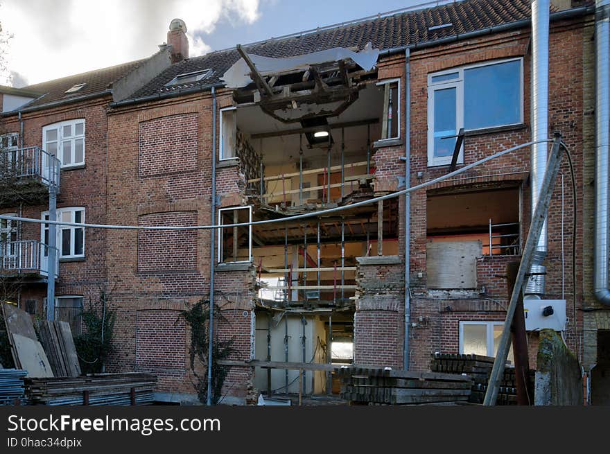 Holme Ringvej 148, built 1917. In late 2013 began an extensive restoration and conversion of this building. The ground-floor restaurant/café was turned into an apartment, most of the building&#x27;s interior walls torn down and an exterior, backside stairwell completely demolished. Windows, doors and roof all replaced. The project ran into severe delays, including the bankrupcy of one of the main companies involved. Due to all the problems, it ended up taking around two years to complete the transformation. View from the backyard, showing the scars after the demolished stairwell. From a registrant photowalk series made for the local historical society. The purpose of these walks is not to take photos of individual buildings, but rather to document the streets as a whole in order to preserve the views for future generations. Some houses will inevitably be obscured behind fences and hedges. In such cases, there will be a photo of the hedge or fence in question. The photo will, of course, be rubbish, but it will accurately show the best possible view from a public road. Over the years, fences and hedges will come and go &#x28;as will the houses&#x29;, sometimes improving the views, other times, the opposite. I&#x27;ve made every attempt to blur visible names, faces and license plates, in order to respect people&#x27;s privacy. Holme Ringvej 148, built 1917. In late 2013 began an extensive restoration and conversion of this building. The ground-floor restaurant/café was turned into an apartment, most of the building&#x27;s interior walls torn down and an exterior, backside stairwell completely demolished. Windows, doors and roof all replaced. The project ran into severe delays, including the bankrupcy of one of the main companies involved. Due to all the problems, it ended up taking around two years to complete the transformation. View from the backyard, showing the scars after the demolished stairwell. From a registrant photowalk series made for the local historical society. The purpose of these walks is not to take photos of individual buildings, but rather to document the streets as a whole in order to preserve the views for future generations. Some houses will inevitably be obscured behind fences and hedges. In such cases, there will be a photo of the hedge or fence in question. The photo will, of course, be rubbish, but it will accurately show the best possible view from a public road. Over the years, fences and hedges will come and go &#x28;as will the houses&#x29;, sometimes improving the views, other times, the opposite. I&#x27;ve made every attempt to blur visible names, faces and license plates, in order to respect people&#x27;s privacy.