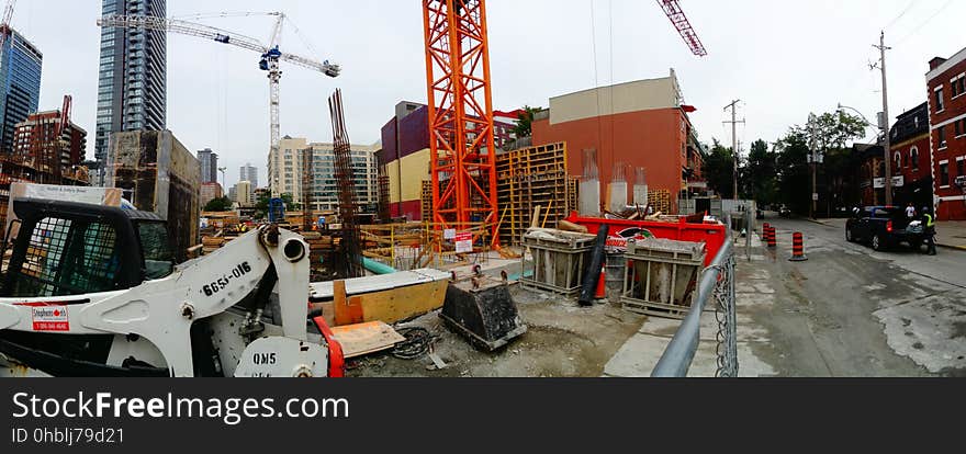 A homeless guy climbed this crane, at Jarvis and Dundas, on 2017-08-02, to protest building luxury condos, not affordable homes -f