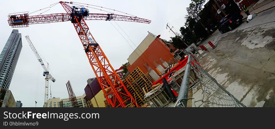 A homeless guy climbed this crane, at Jarvis and Dundas, on 2017-08-02, to protest building luxury condos, not affordable homes -g