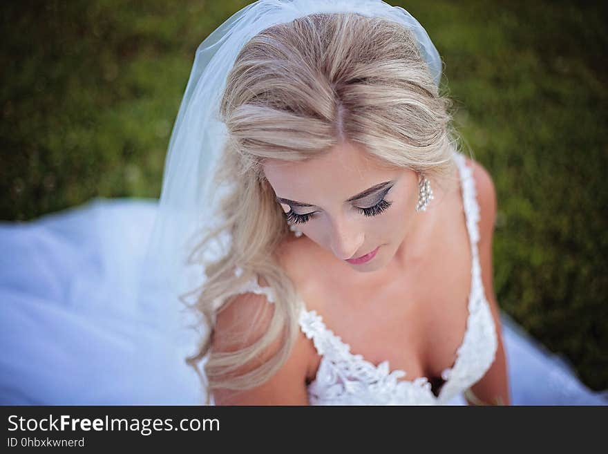 A portrait of a bride in white dress and veil. A portrait of a bride in white dress and veil.