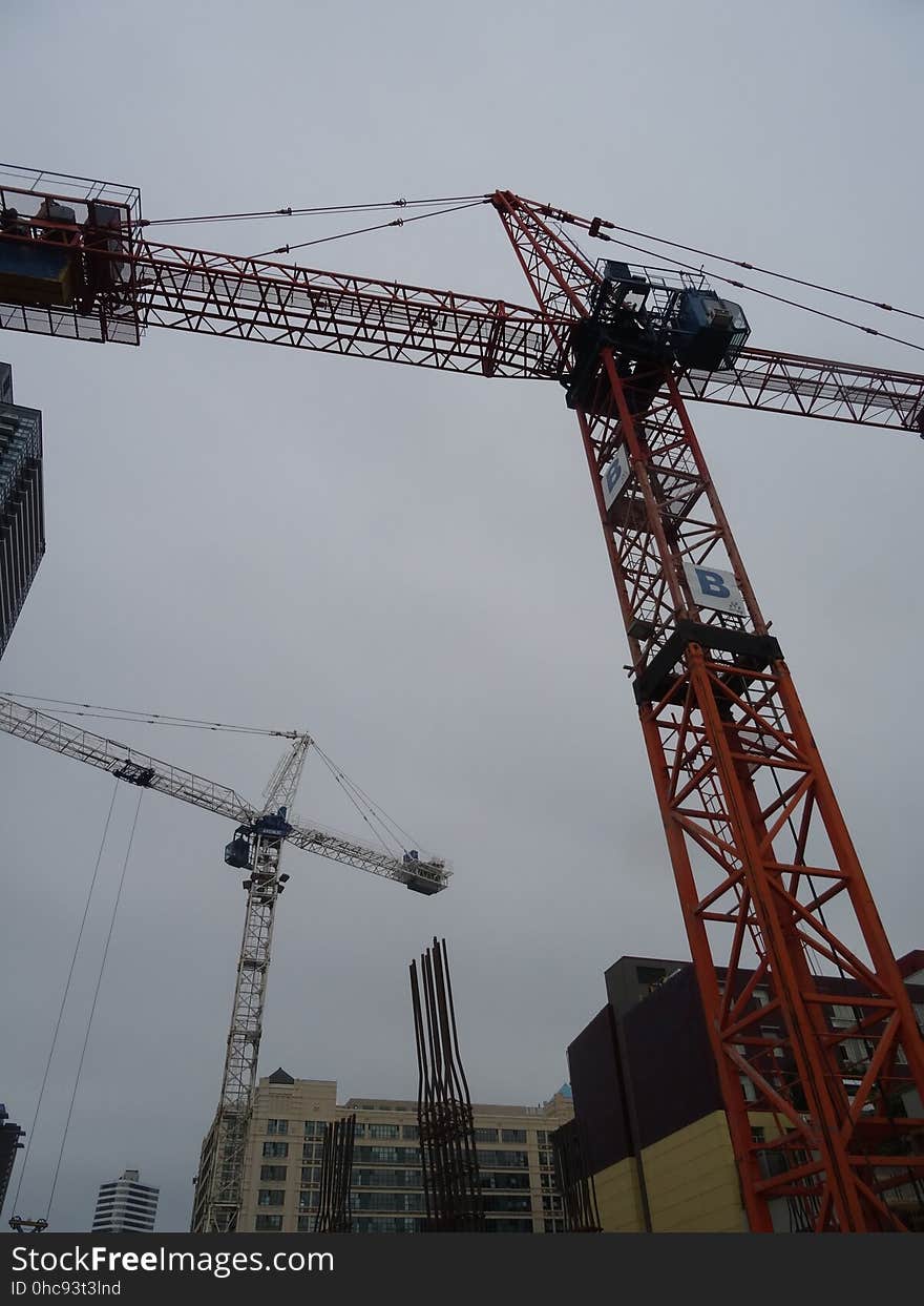 A homeless guy climbed this crane, at Jarvis and Dundas, on 2017-08-02, to protest building luxury condos, not affordable homes -b