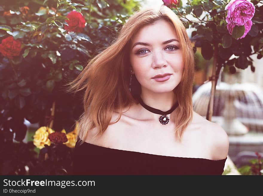 Girl With Red Hair In A Black Dress