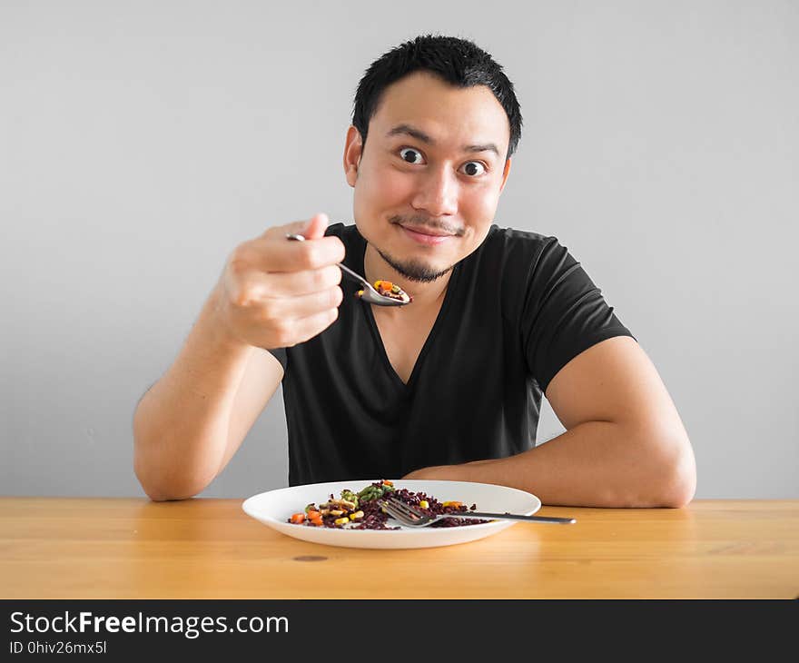 Asian man eats clean food for good healthy life. Asian man eats clean food for good healthy life.