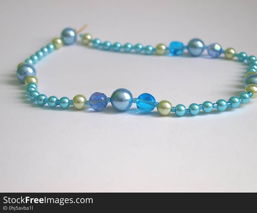 Blue pearls necklace.