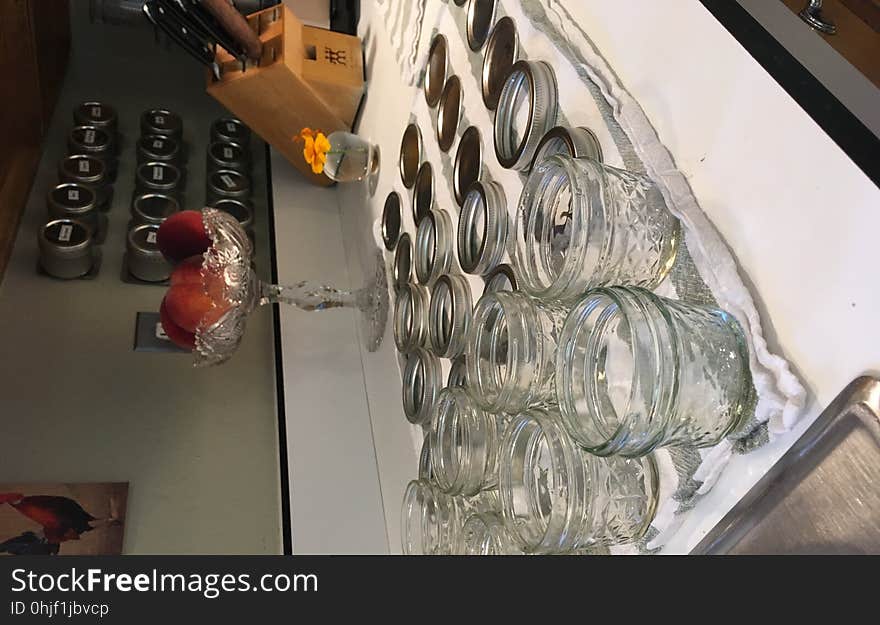 Washed small jam jars with lids and rings