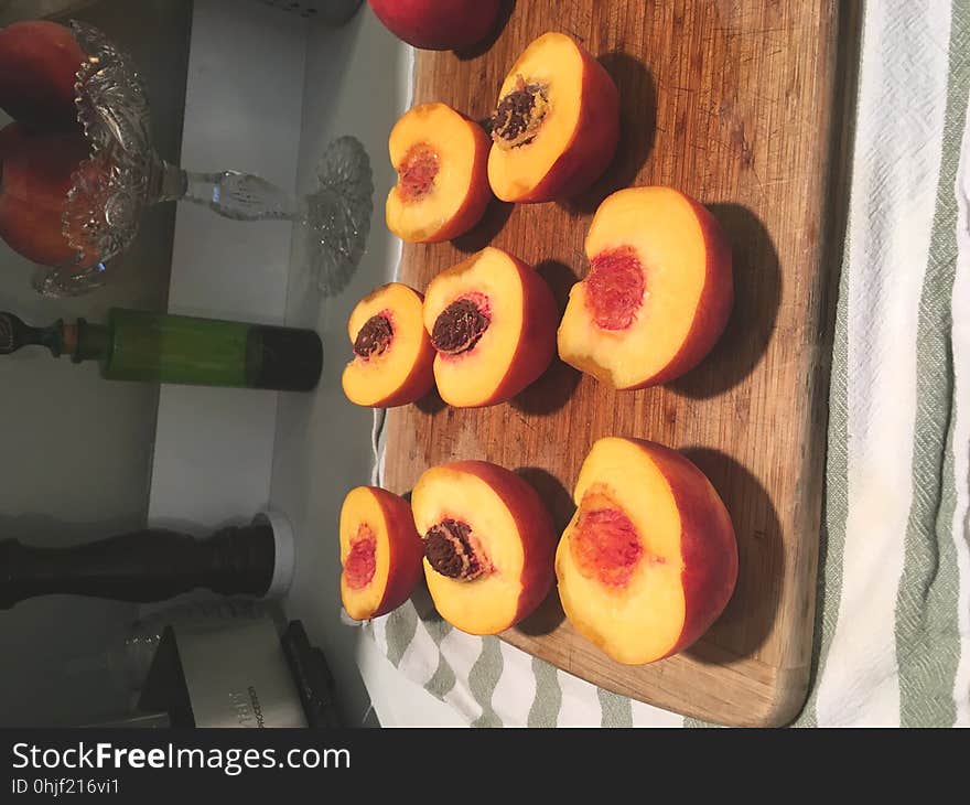 Halved fresh peaches