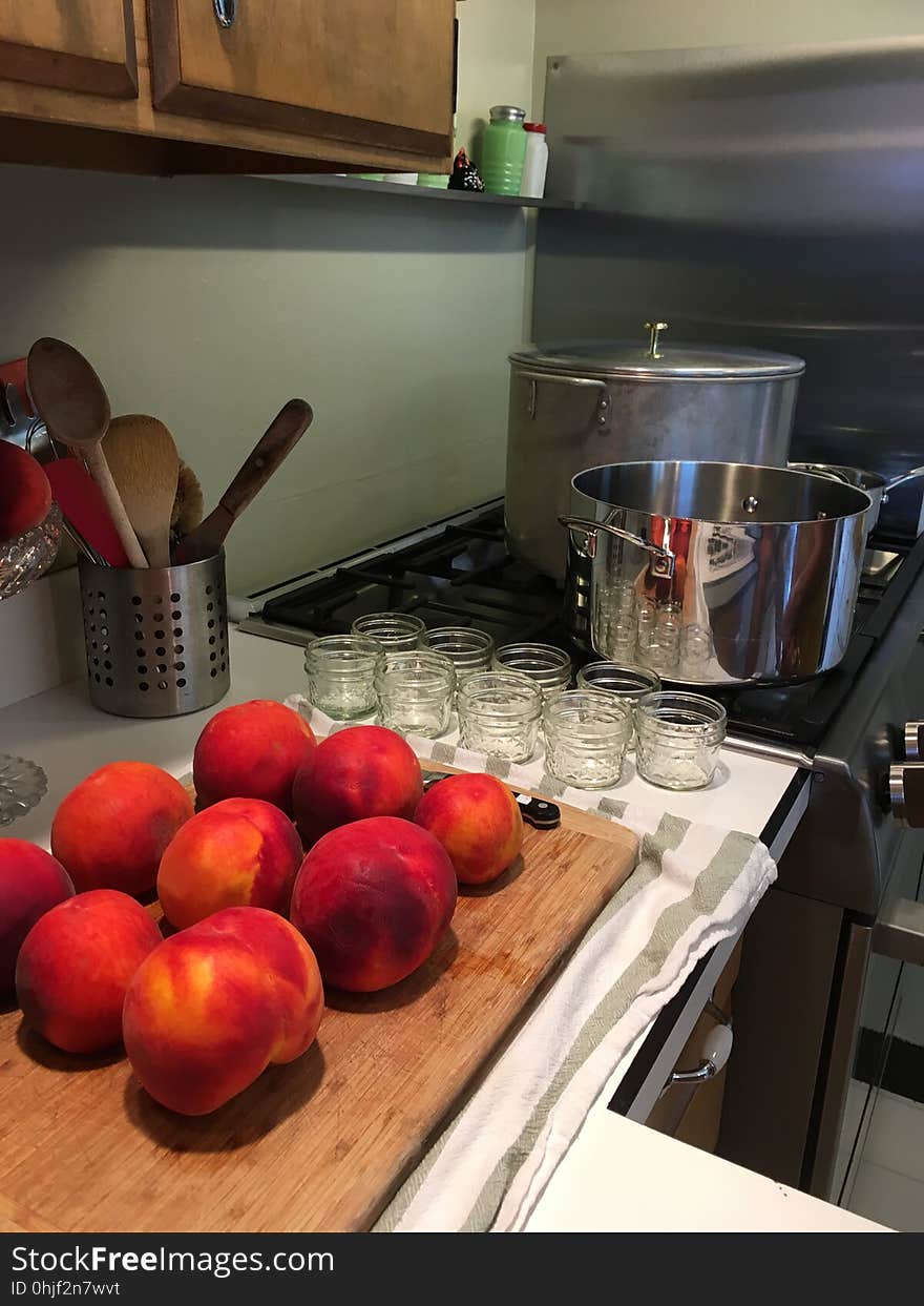 Peaches with jam jars and boiling water bath canner