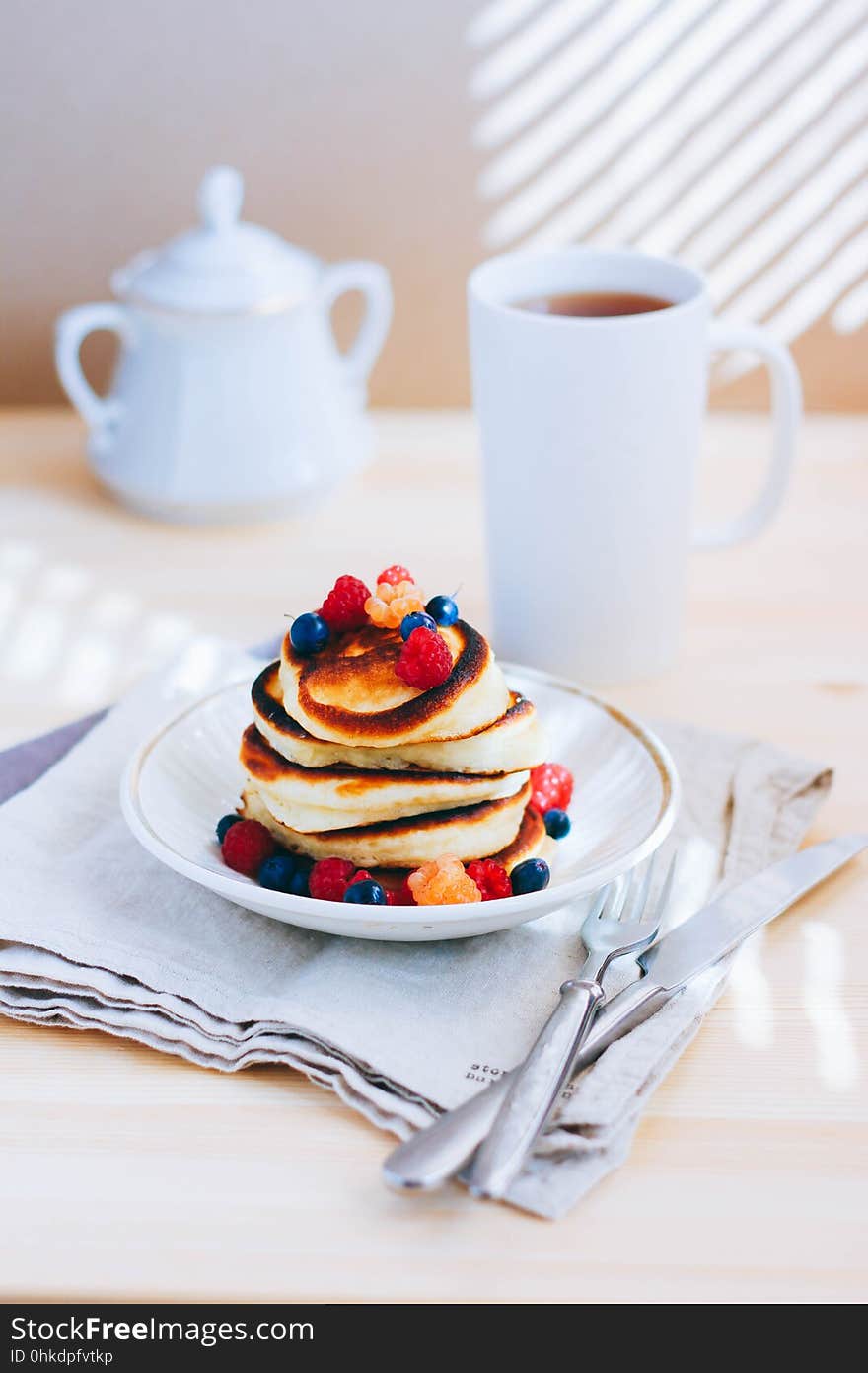 Breakfast, lush pancakes with fresh berries