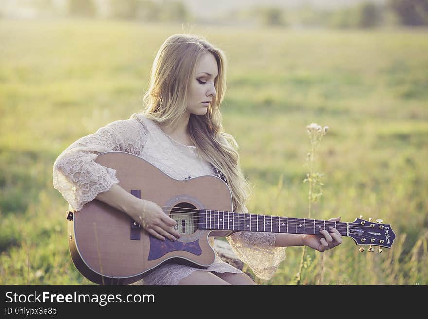 Grass, Human Hair Color, Sitting, Girl