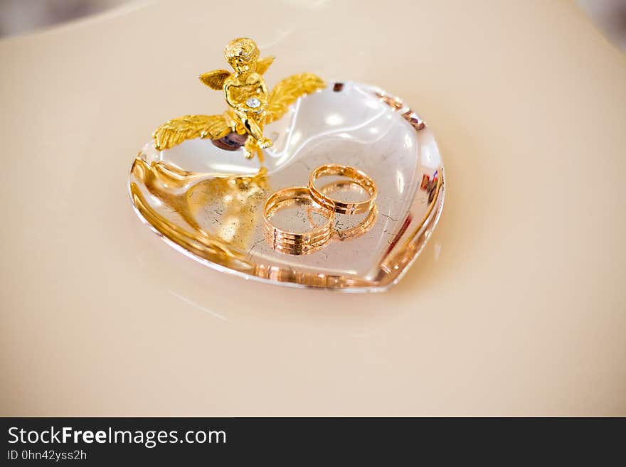 Wedding rings on a plate in the registry office