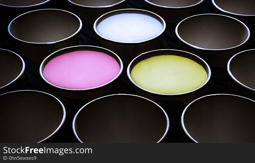 Close up of colorful powders in compact.